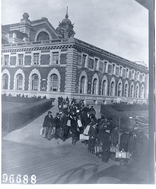 Archival arrival photograph, progressively treated in the Perebel duotone